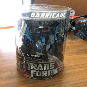 Transformers Movie Deluxe Exclusive Figure in Canister Barricade 2007 FRENLY BRICKS - Open 7 Days