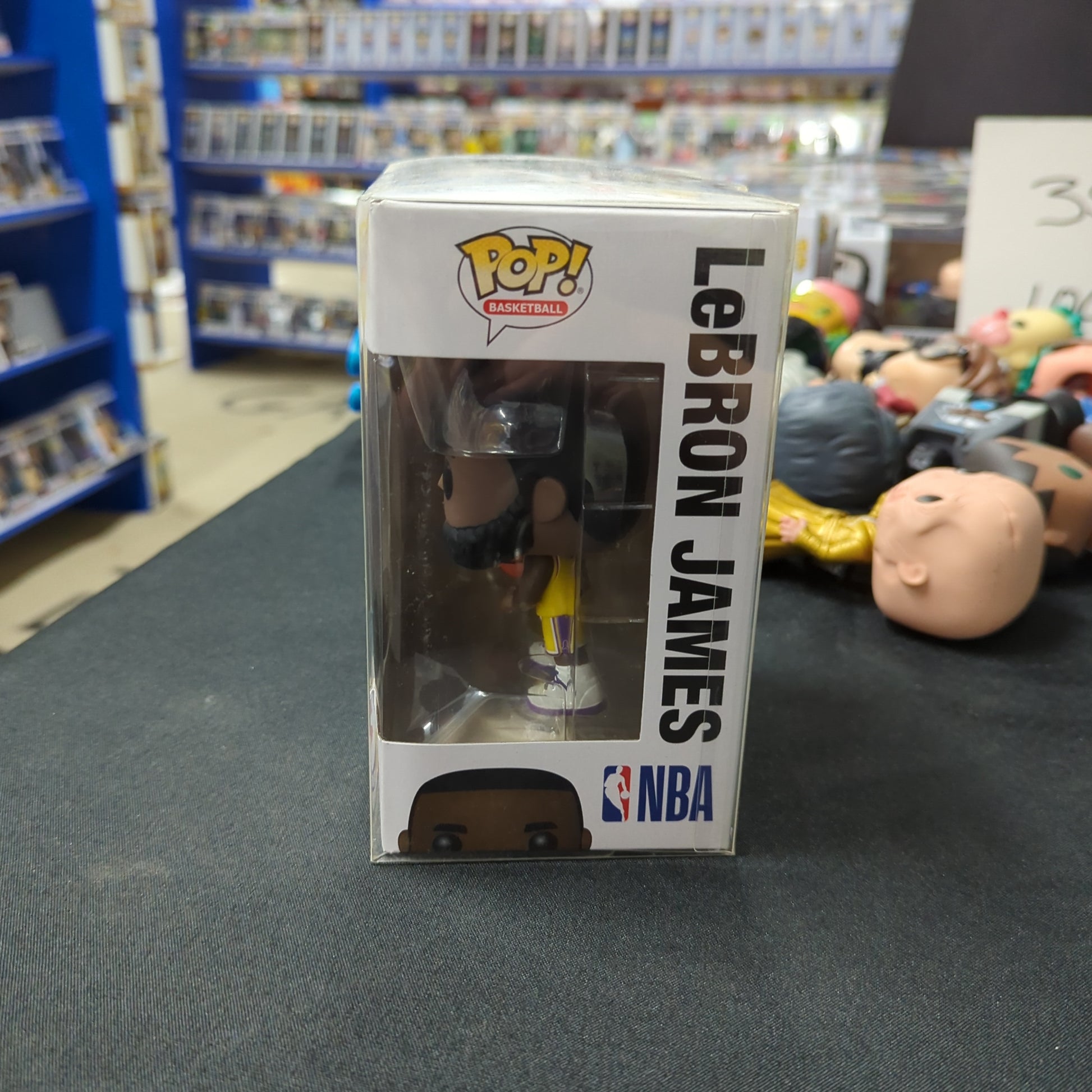 FUNKO NBA L.A Lakers - LeBron James Yellow Uniform Pop Vinyl. 52 FRENLY BRICKS - Open 7 Days