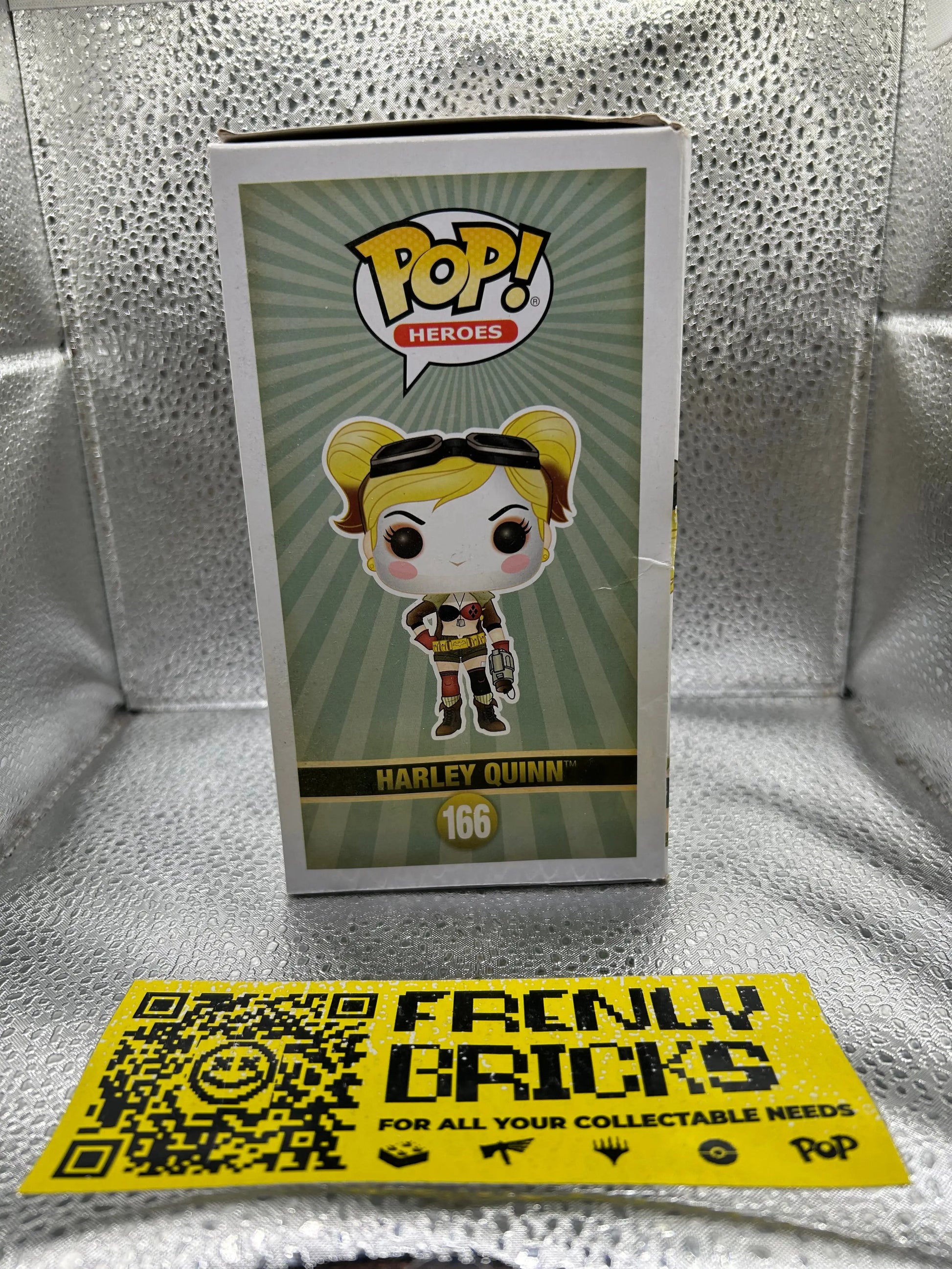 POP VINYL DC 166 HEROES HARLEY QUINN FRENLY BRICKS - Open 7 Days