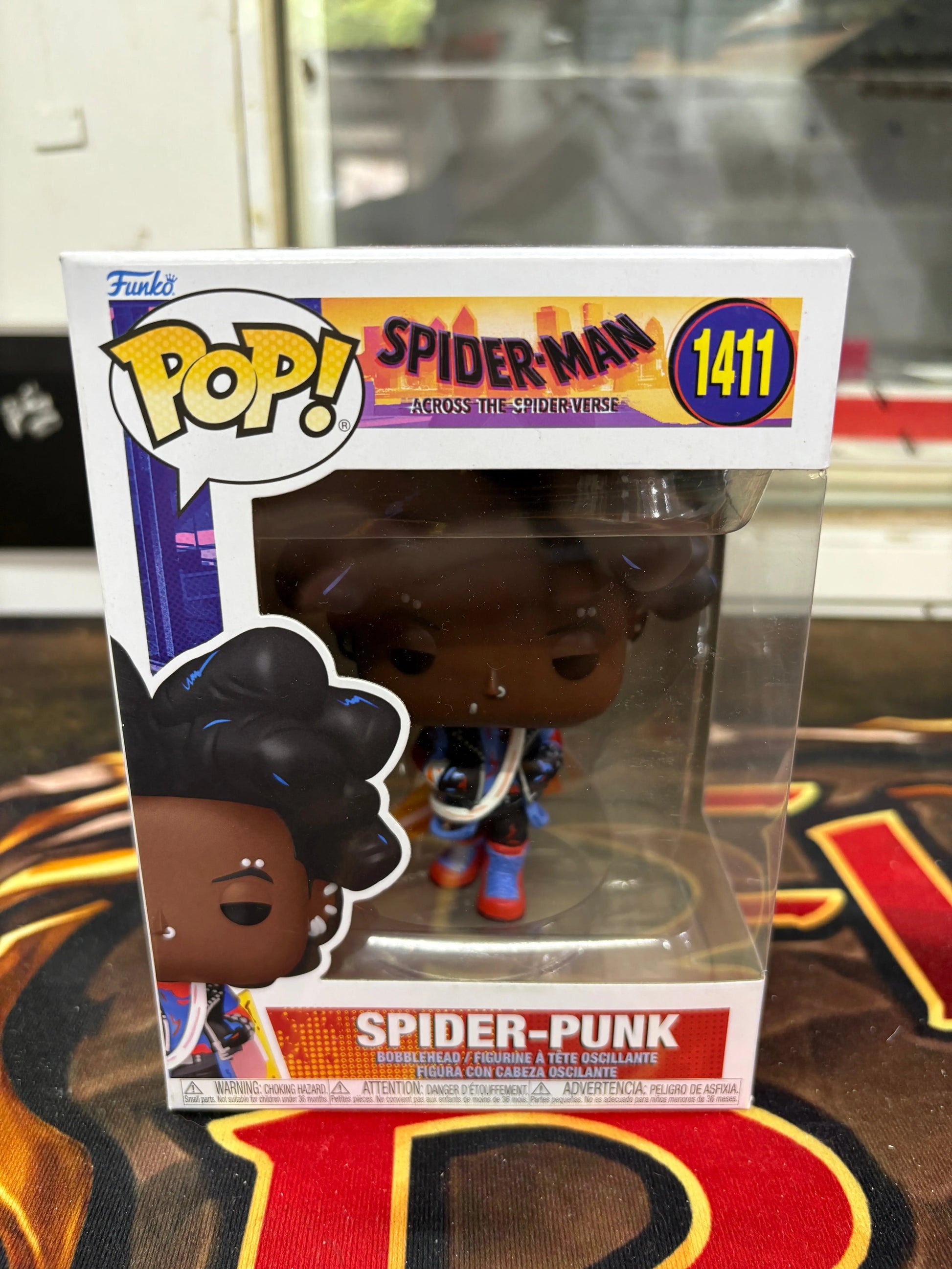 Funko Pop! Marvel: Spider-Man: Across The Spider-Verse - Spider-Punk#1411 FRENLY BRICKS - Open 7 Days