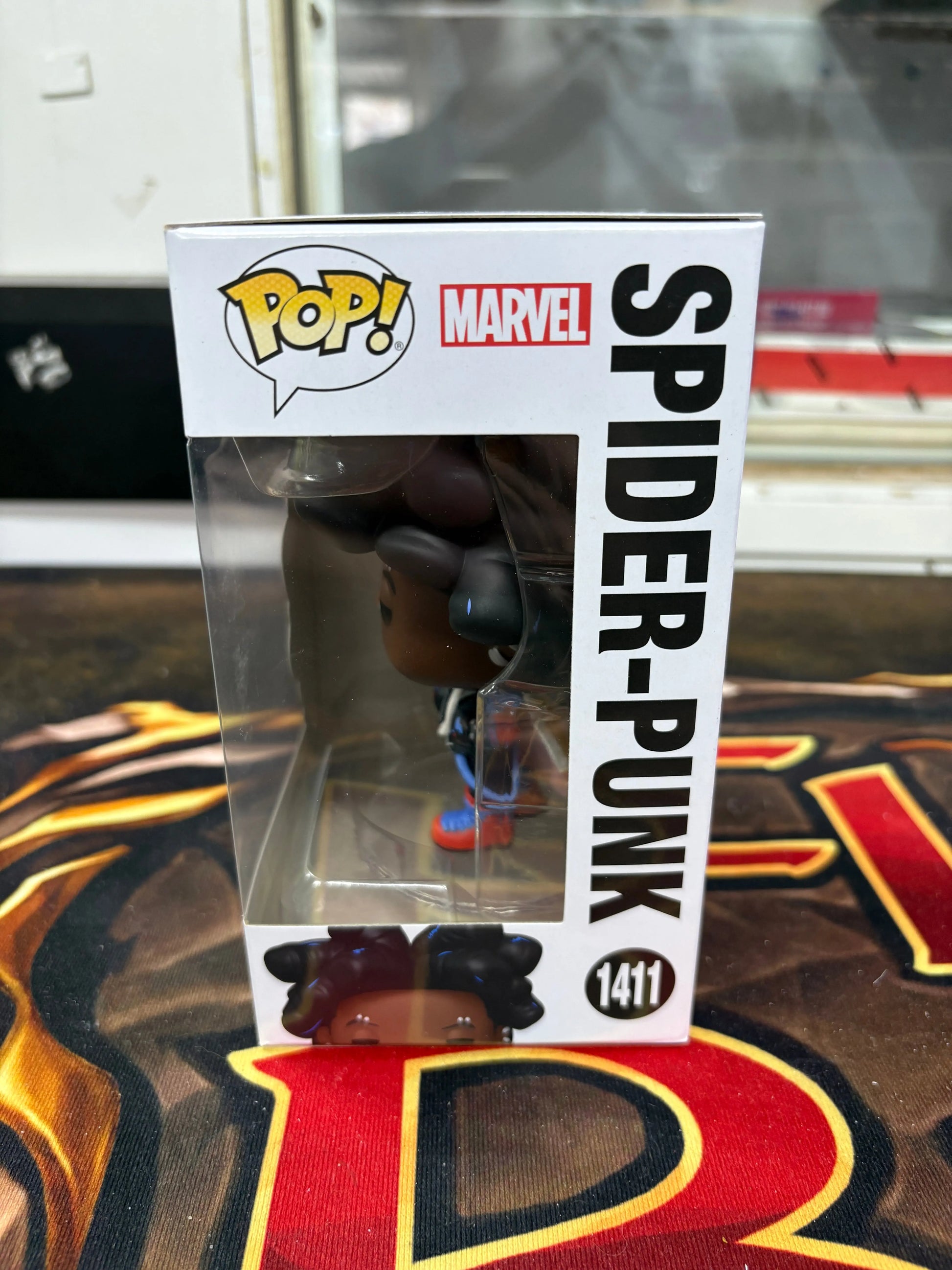 Funko Pop! Marvel: Spider-Man: Across The Spider-Verse - Spider-Punk#1411 FRENLY BRICKS - Open 7 Days
