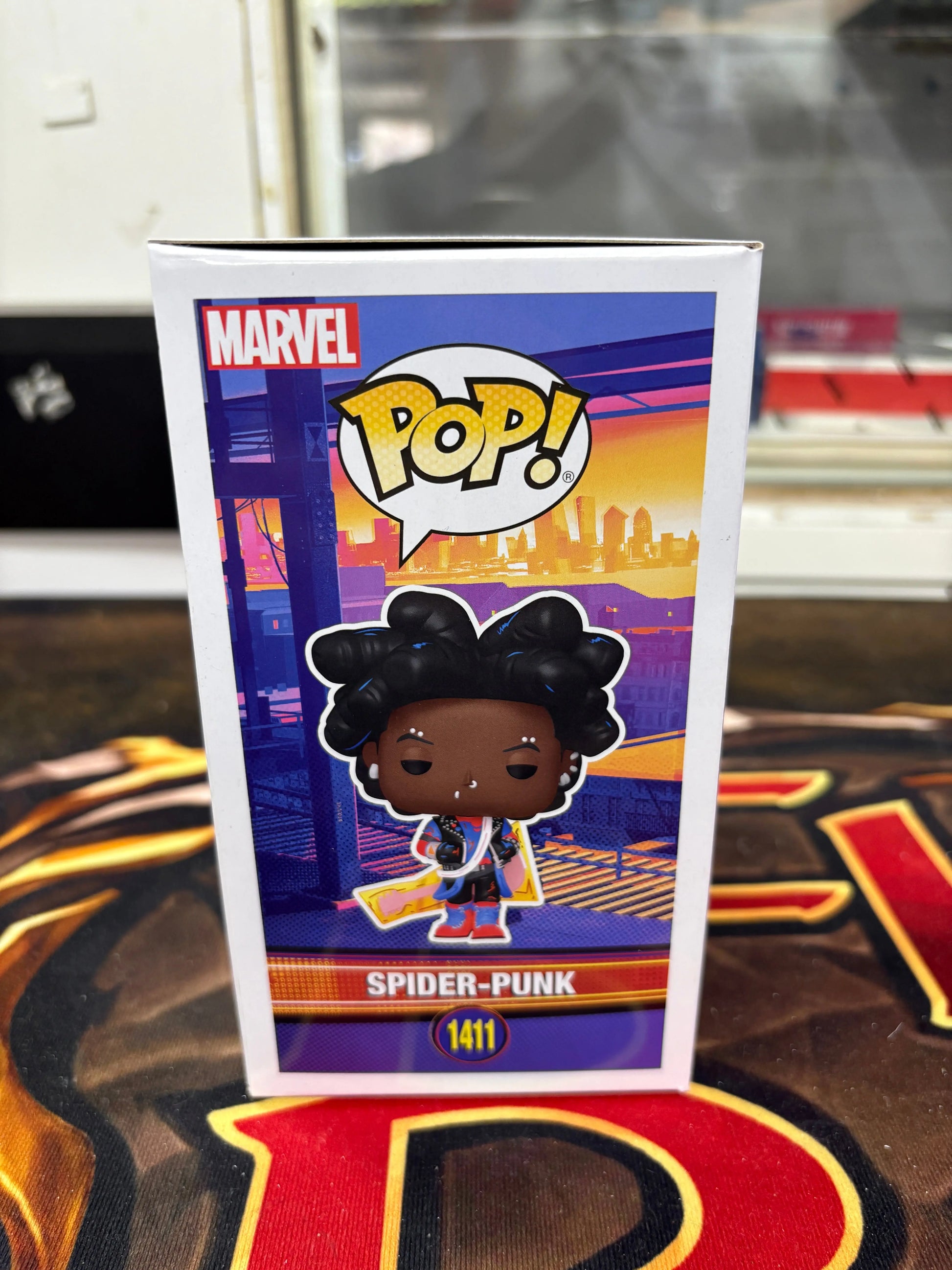 Funko Pop! Marvel: Spider-Man: Across The Spider-Verse - Spider-Punk#1411 FRENLY BRICKS - Open 7 Days