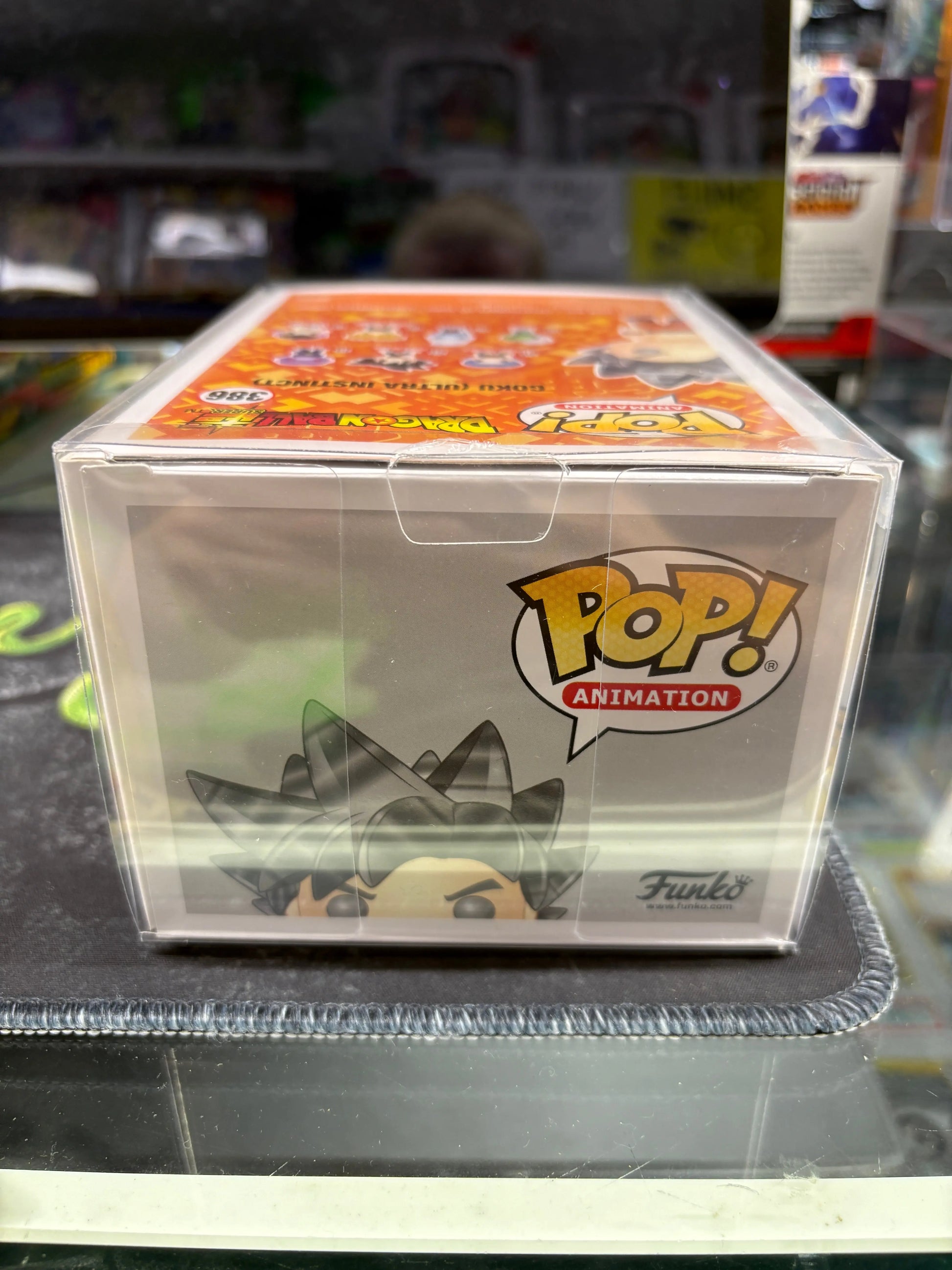 Funko Pop! Vinyl: Dragon Ball - Goku (Ultra Instinct Form) #386 FRENLY BRICKS - Open 7 Days