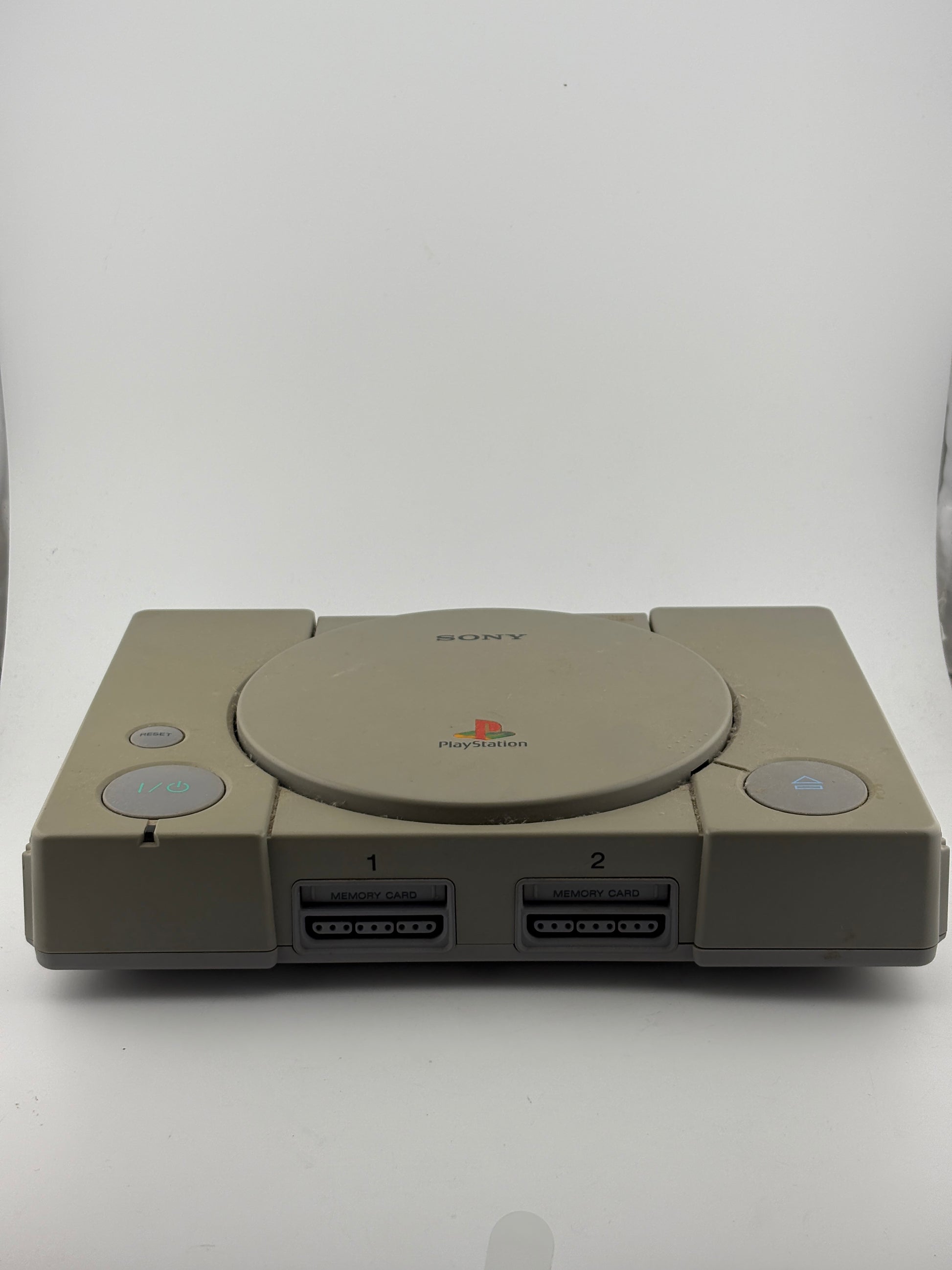 Original PlayStation One Console with 2 Controllers and Cabels (Power Tested Turns On)