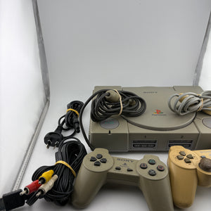 Original PlayStation One Console with 2 Controllers and Cabels (Power Tested Turns On)