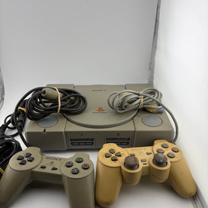 Original PlayStation One Console with 2 Controllers and Cabels (Power Tested Turns On)