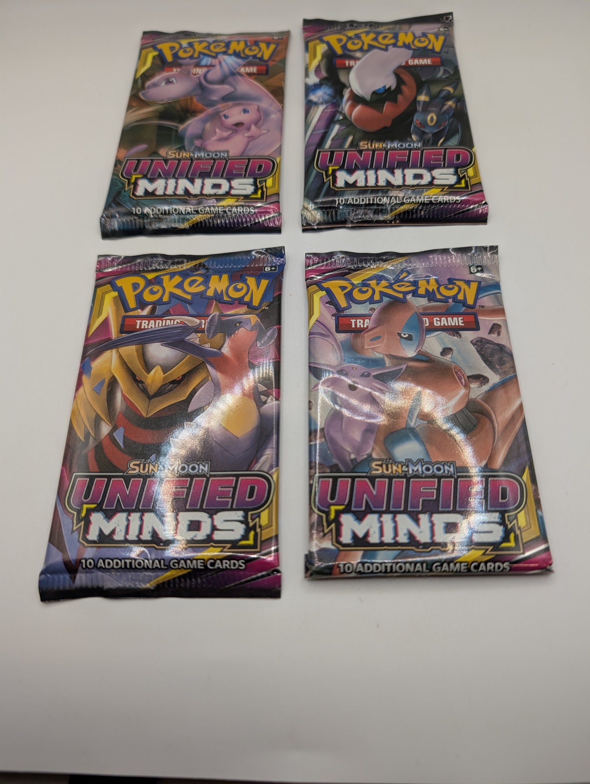 POKEMON TCG SUN & MOON UNIFIED MINDS - 4x Booster Packs - Art Set Factory Sealed FRENLY BRICKS - Open 7 Days