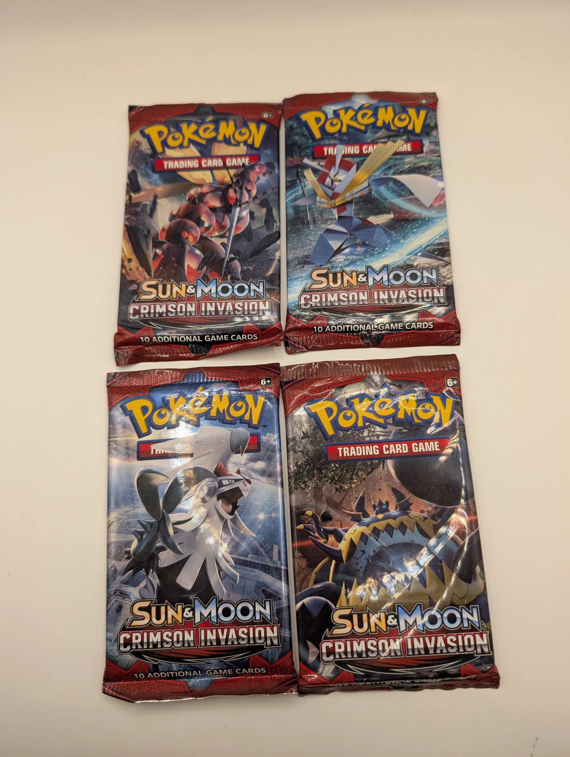 Crimson Invasion - Sealed 4 Booster Pack Art Set - Pokémon Sun & Moon TCG, photo 2 image 2