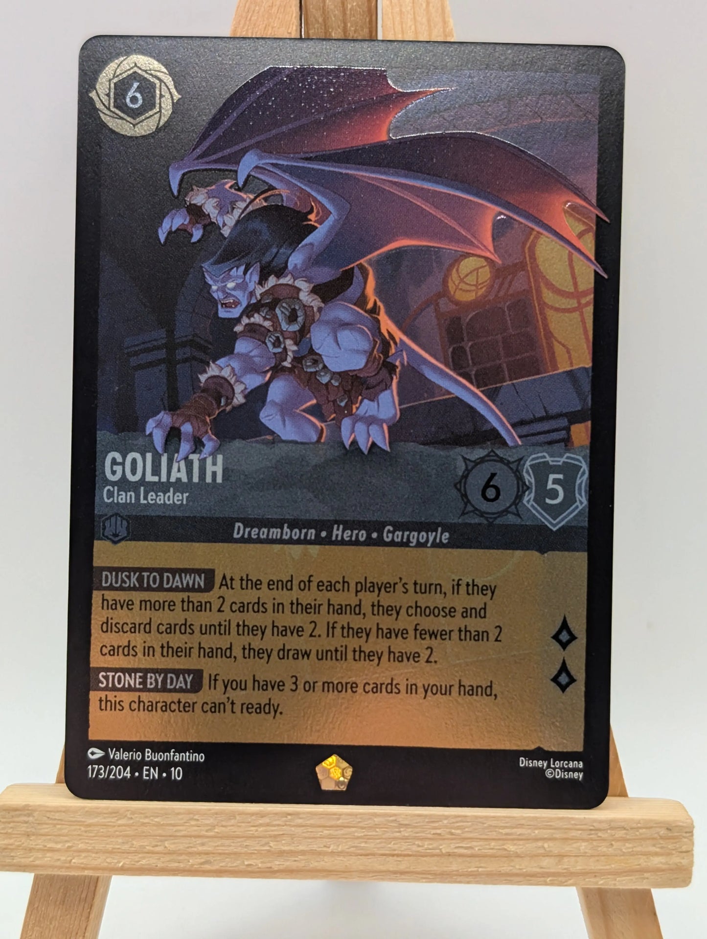 Disney Lorcana Whispers In The Well. Goliath - Clan Leader FOIL 173/204 FRENLY BRICKS - Open 7 Days